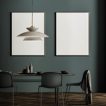 Dark grey dining room interior with two posters