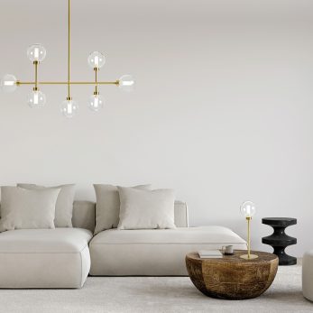 Stylish living room in beige tones with a sofa, a sconce, a wood