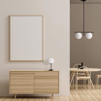 Mock up poster frame in modern interior with wooden furnitures.