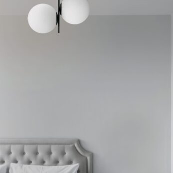 Cozy bedroom corner in minimal modern style with empty cool gray