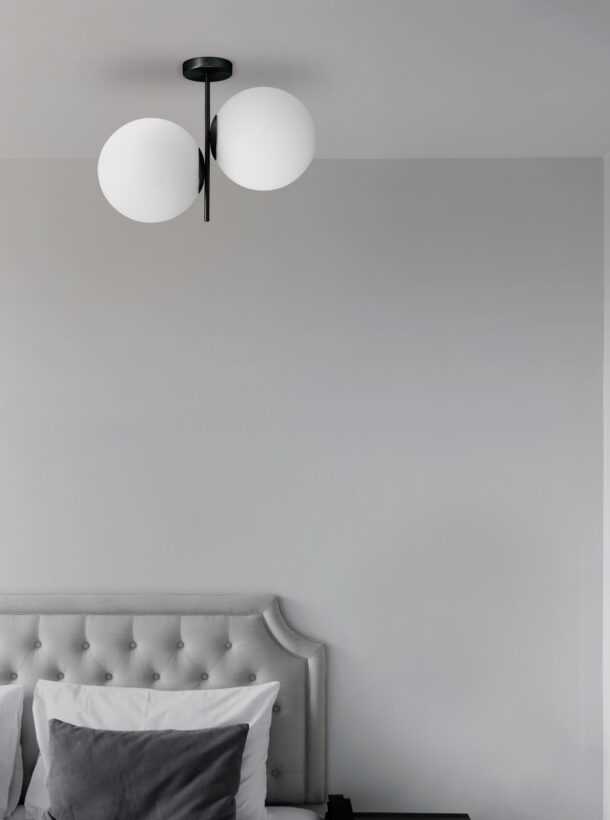 Cozy bedroom corner in minimal modern style with empty cool gray